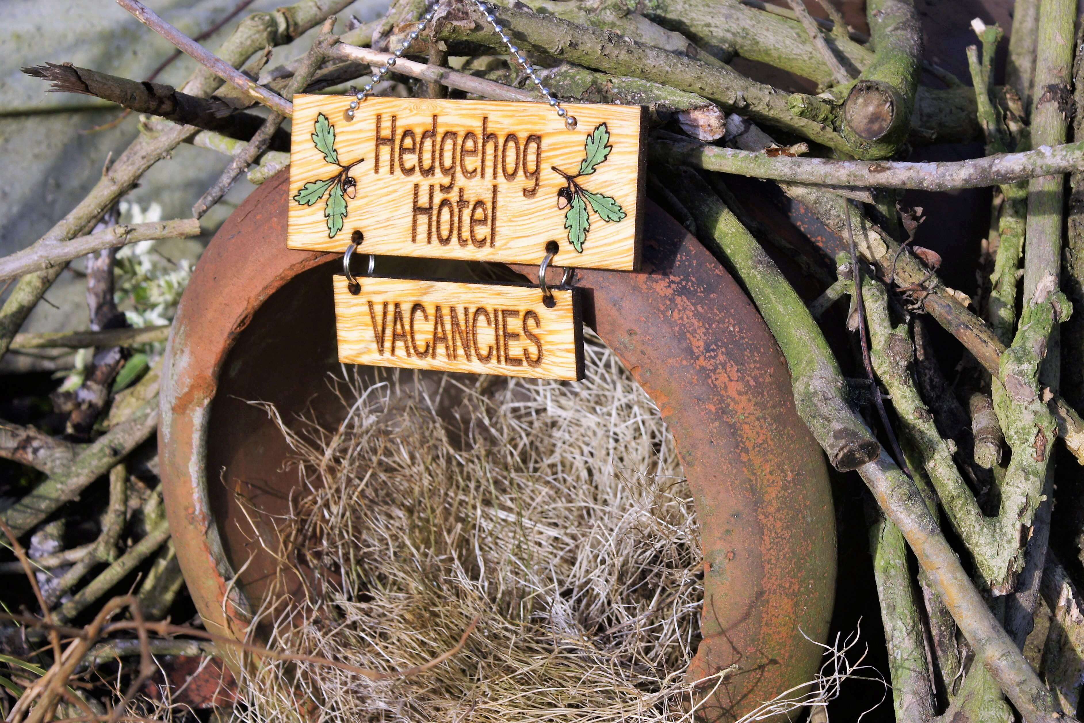 hedgehog hotel with laser engraved wood sign